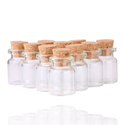 A set of 5 5mL corked apothecary jars.  Great for storing herbs, oils, dried flowers, moon water, and more!